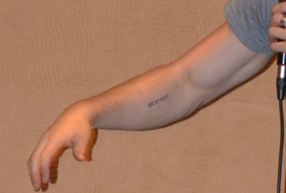 Ian_tattoo_closeup. hic et nunc: Latin for "here and now". 